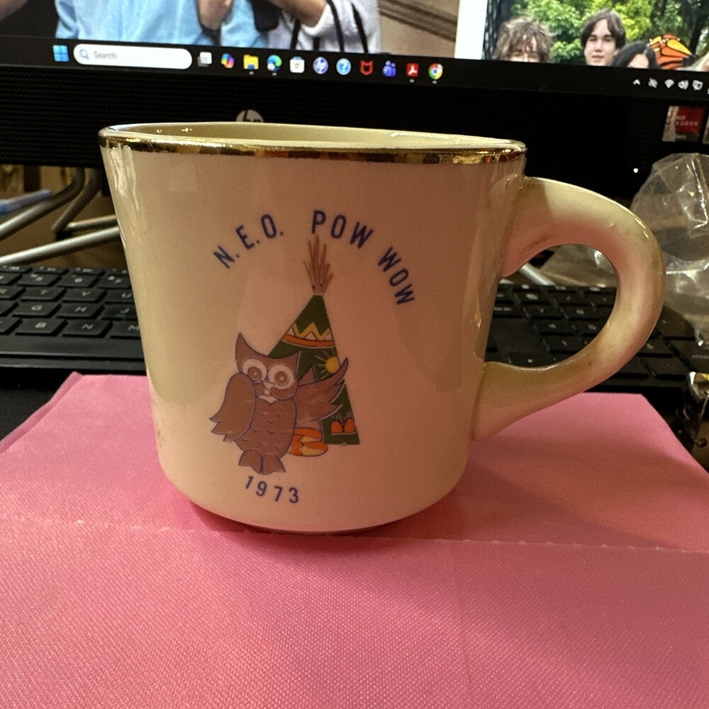 N.E.O Pow Wow coffee cup